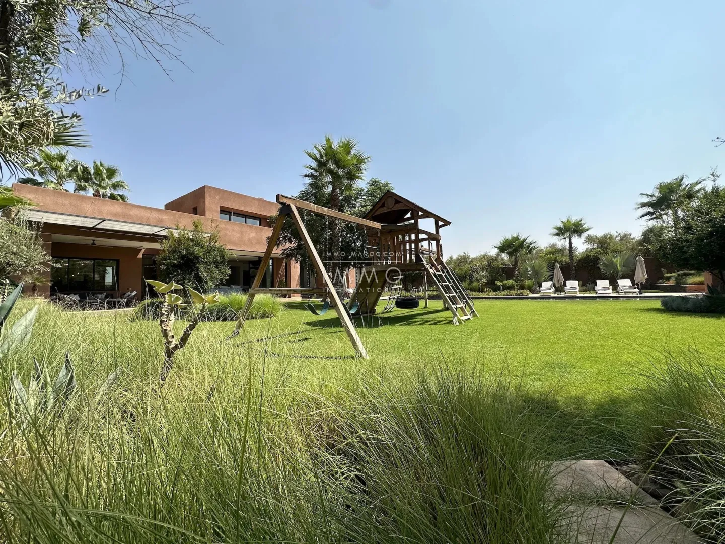 Luxury contemporary villa with infinity pool for sale on the ourika road in marrakech.