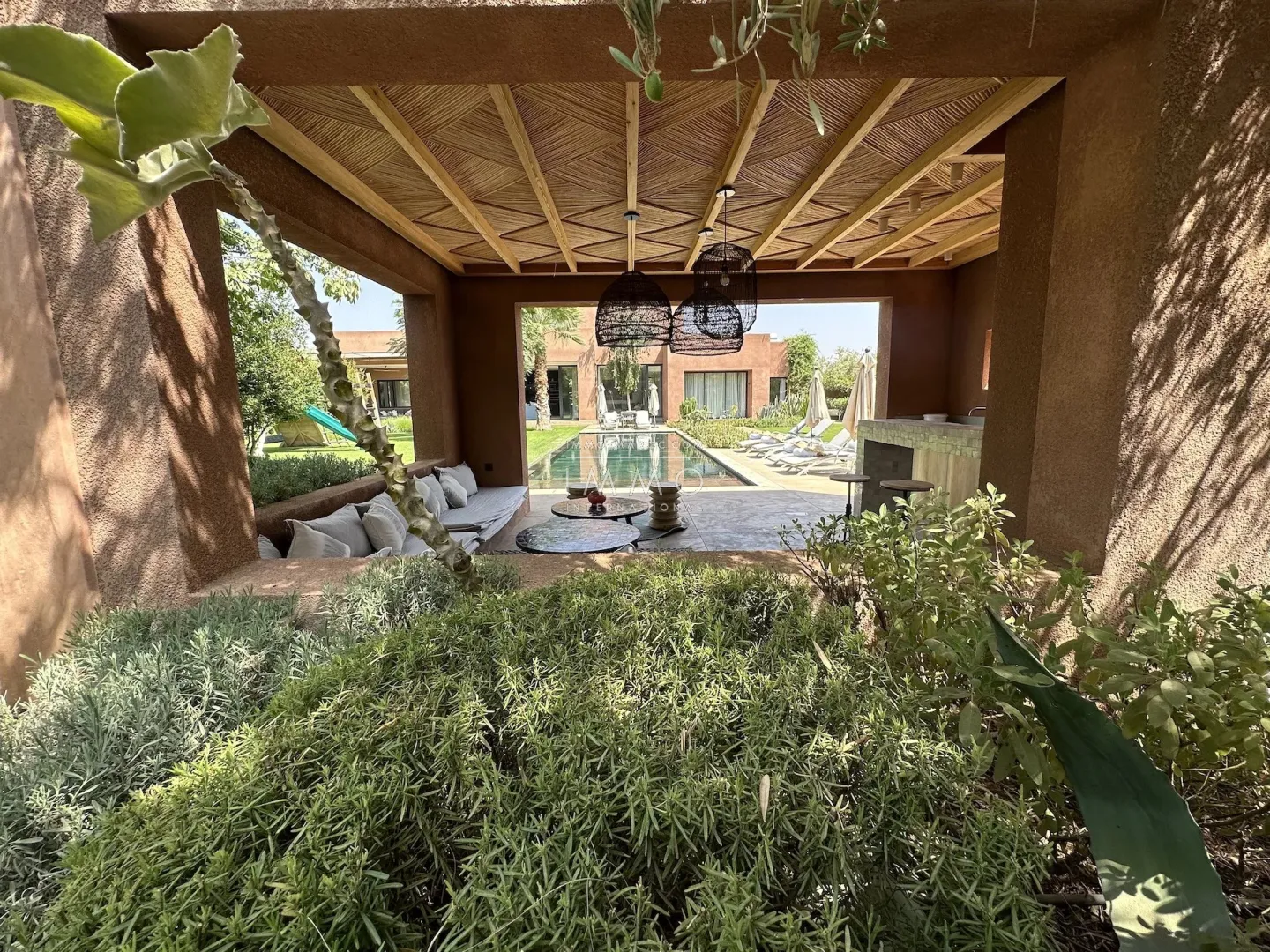 Luxury contemporary villa with infinity pool for sale on the ourika road in marrakech.