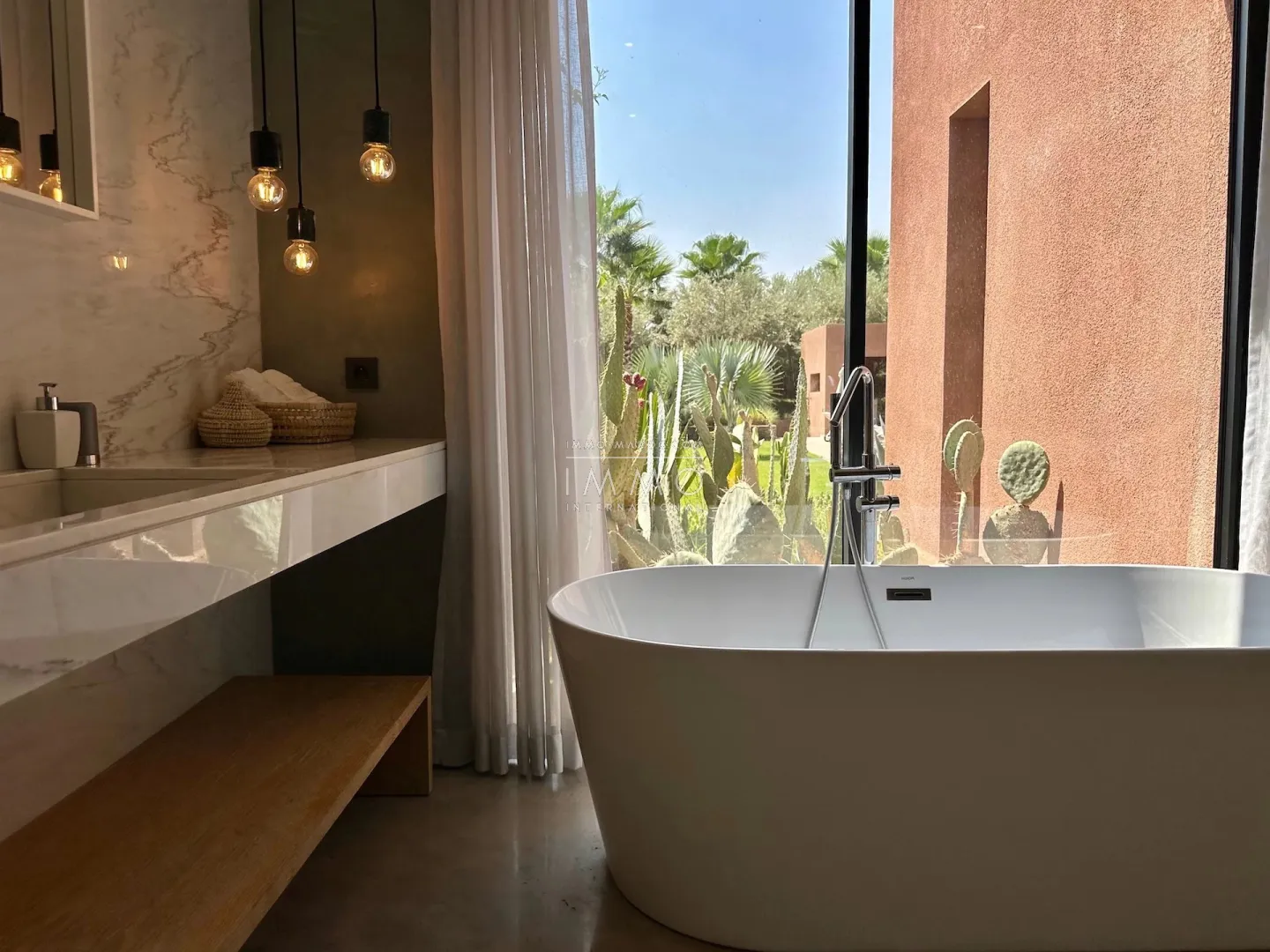 Luxury contemporary villa with infinity pool for sale on the ourika road in marrakech.