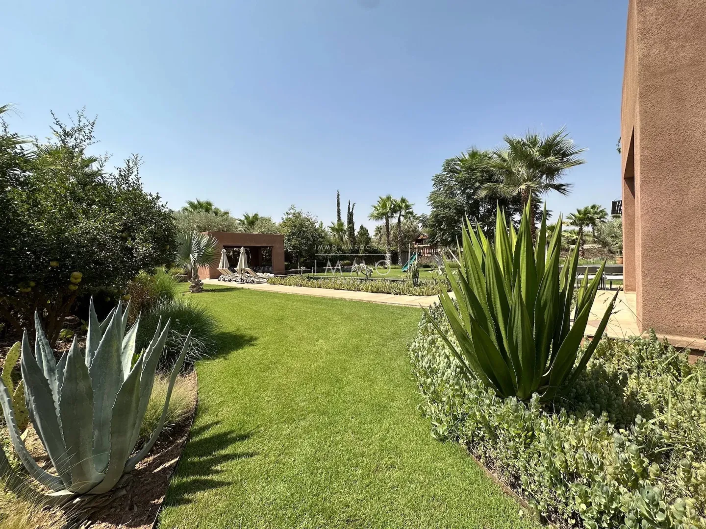 Luxury contemporary villa with infinity pool for sale on the ourika road in marrakech.