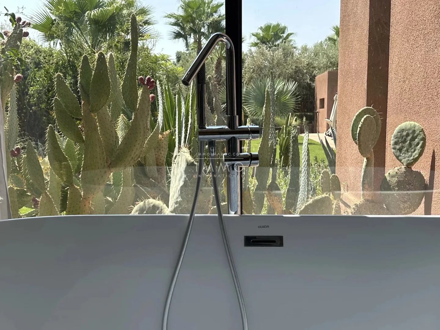 Luxury contemporary villa with infinity pool for sale on the ourika road in marrakech.